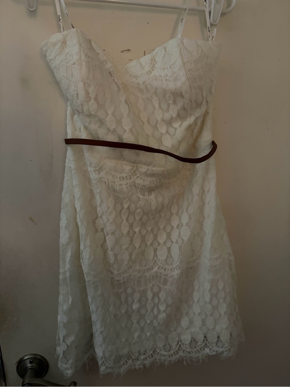 White lace strapless dress with brown belt